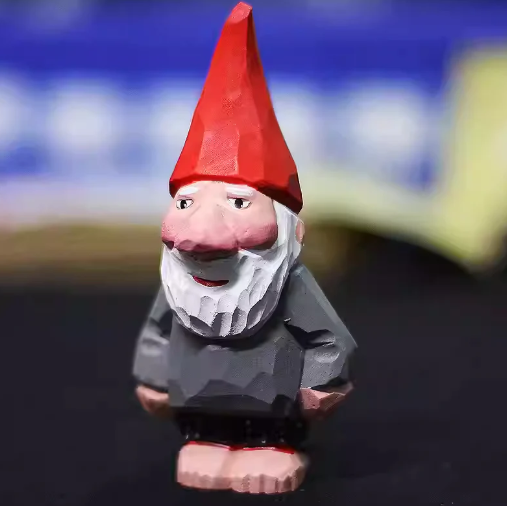 big nose wooden santa