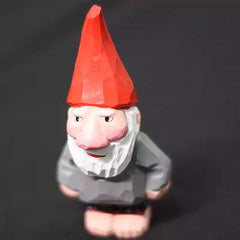 op‑down angle shot of wood carved Santa Claus figurine showing detailed carving lines, ideal for wood carved Santa Claus collectors.