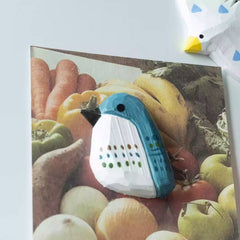 Blue bird wooden fridge magnet close up detail