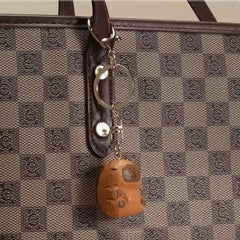 Capybara wooden keychain on bag