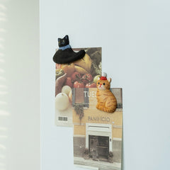 cat fridge magnets on refrigerator