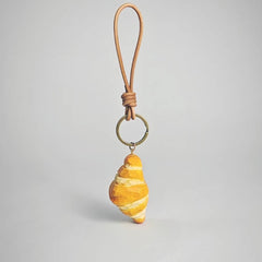 Croissant wooden keychain with leather strap