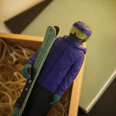 Custom ski figurine displayed in gift box, handmade wooden skier keepsake