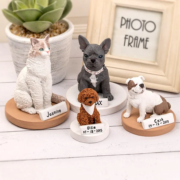 Collection of personalized dog and cat statues