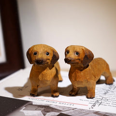 Miniature dachshund figurine display