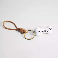 hand carved wooden dog bone keychain