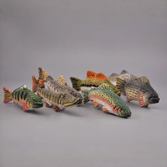 Svn Futures  fish figurines showing different carved designs