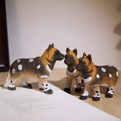 Hand carved african wild dog figurine