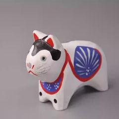 Front view of inu hariko wooden figurine
