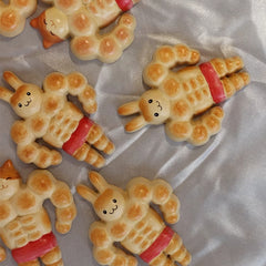 Handmade muscle bread bunny and cat fridge magnets