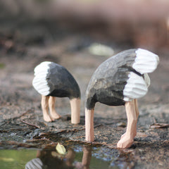 Artisan-crafted ostrich figure made of wood on display