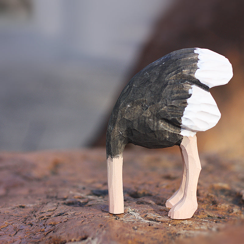 Hand-painted wooden ostrich statue with detailed feather textures