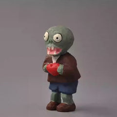 Hand-carved zombie holding red heart, Plants vs. Zombies collectible