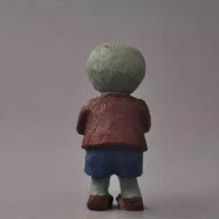 Back view of hand-carved Plants vs. Zombies zombie wooden sculpture