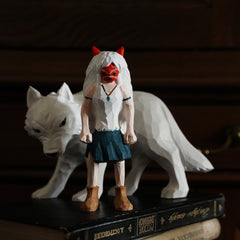 hand carved wooden Princess Mononoke figurine standing upright