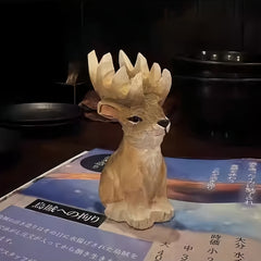 Svn Futures  reindeer figurines for Christmas – rustic carving set on a Japanese restaurant menu.