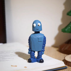 wooden robot figurine inspired by Robot Dreams