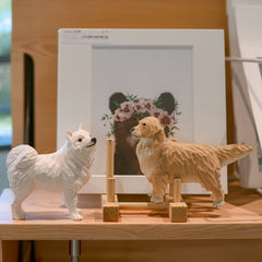 Samoyed figurine on shelf display