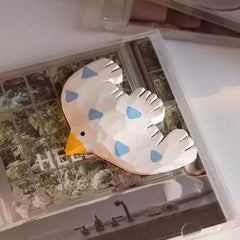 Seagull fridge magnet on book