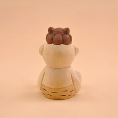 Back view of Setsubun Demon figurine seated