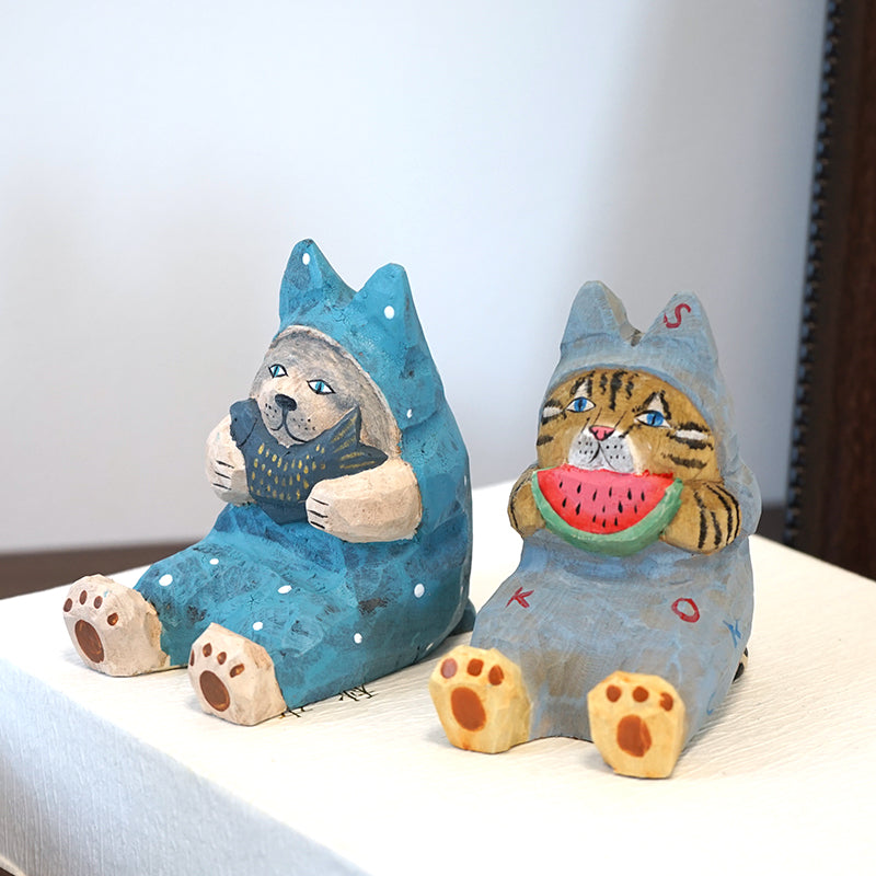 Side view of sitting cat wooden phone holder