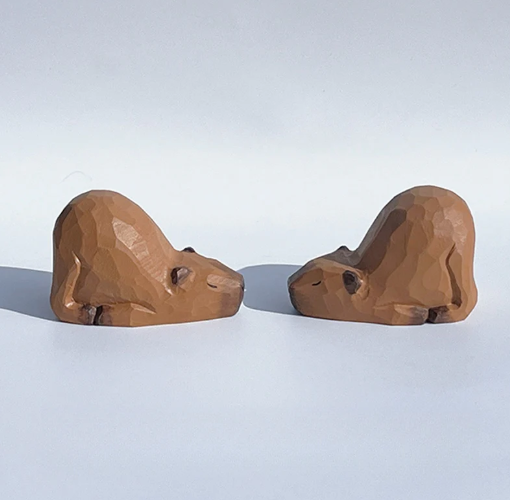 Sleeping capybara figurine