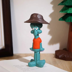 squidward figure with cowboy hat wooden figurine