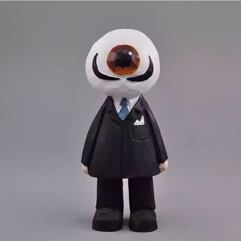 Hand-carved wooden Eyeball Figure in a black suit, inspired by The Residents, standing upright facing forward.