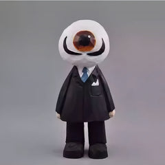 Hand-carved wooden Eyeball Figure in a black suit, inspired by The Residents, standing upright facing forward.