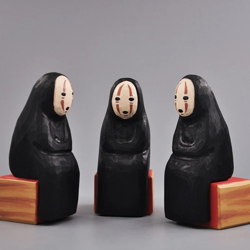 3 No Face wooden sculptures