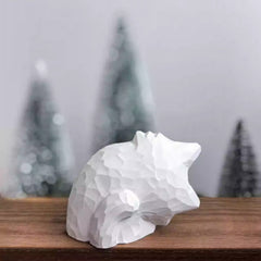 Back view of tilted head cat figurine