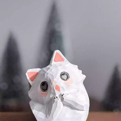 Tilted head cat wooden figurine on shelf