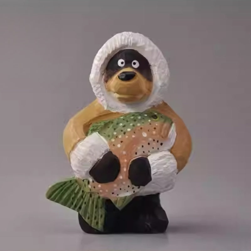 Svn Futures  bear figurine holding a fish wearing winter coat