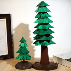 Set of two wooden Christmas trees in varying sizes, displayed together on a wooden surface for cozy holiday decoration.