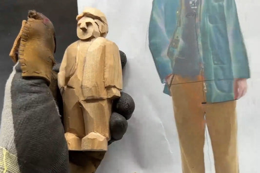 Hand-carving a wooden figurine with coat and collar details for personalized Svn Futures  gifts