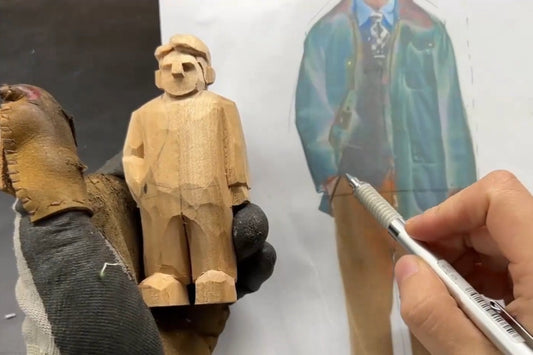 Carving detailed clothing and arm structure on a wooden figurine using a reference photo for Svn Futures  gifts tutorial