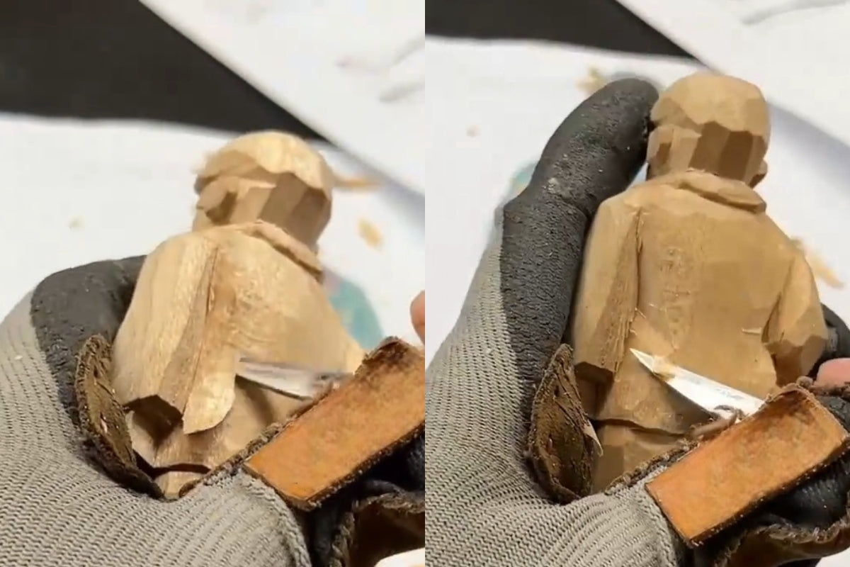 Rounding the back and shaping the left waist fold to add volume and motion in wooden figurine clothing structures.